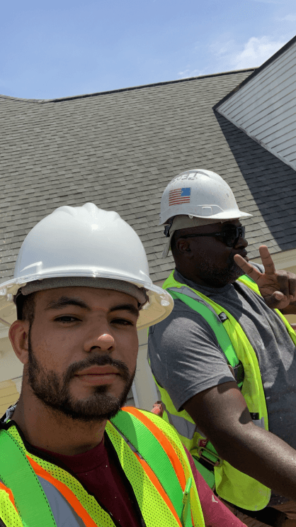Image of two male workers.